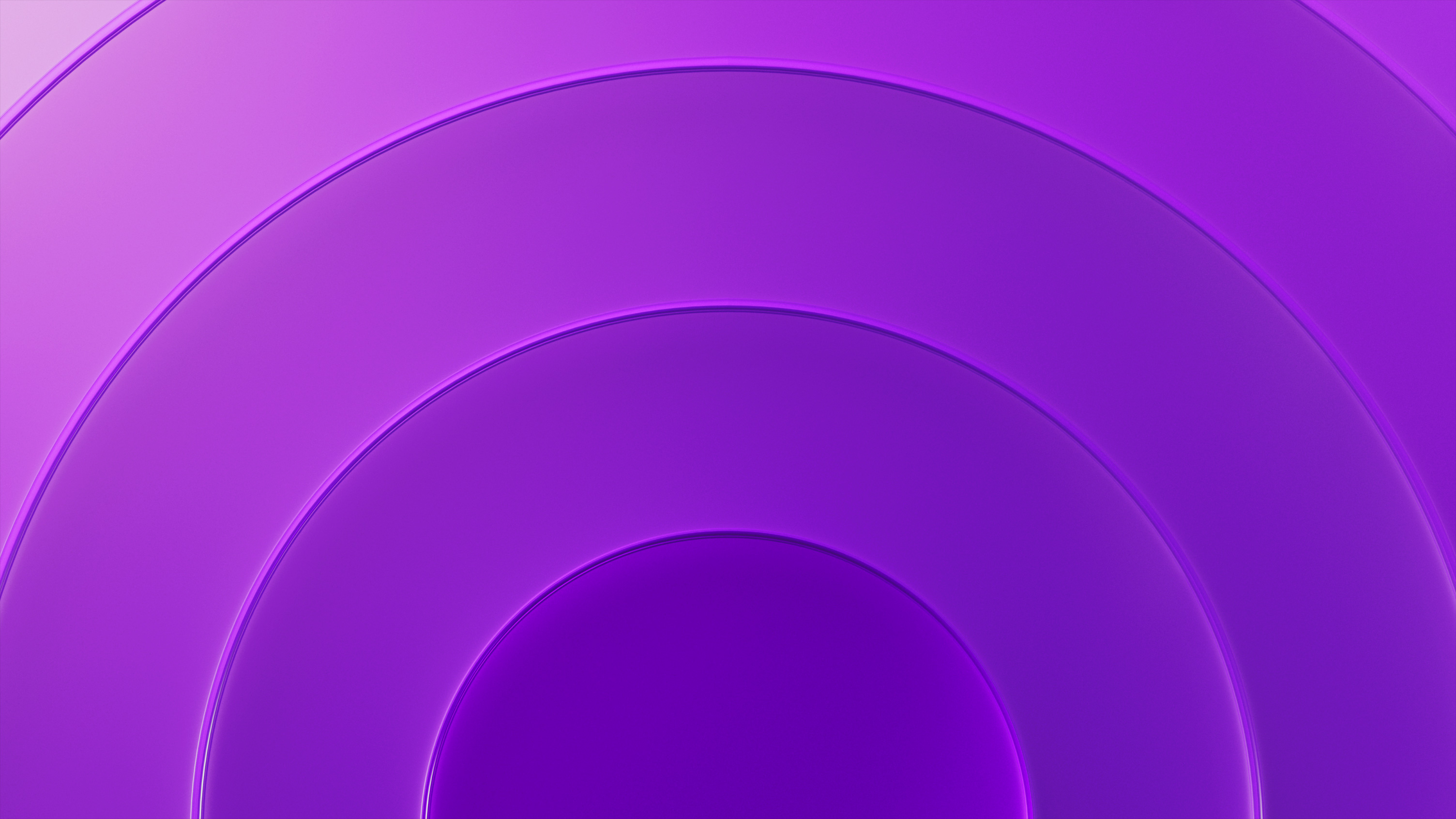 Four oval rings with a deep purple gradient that gets darker as it gets further from the center ring.