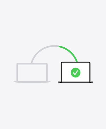 Illustration of two laptops connected by line, second shows a green tick on screen indicating migration process is complete
